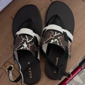 Brand new Cole Haan sandals. The sandals buckle in the back, no longer needed.